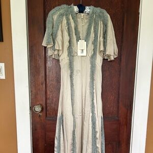 The Great Dancehall dress is silver, icy blue size 0, XS NWT